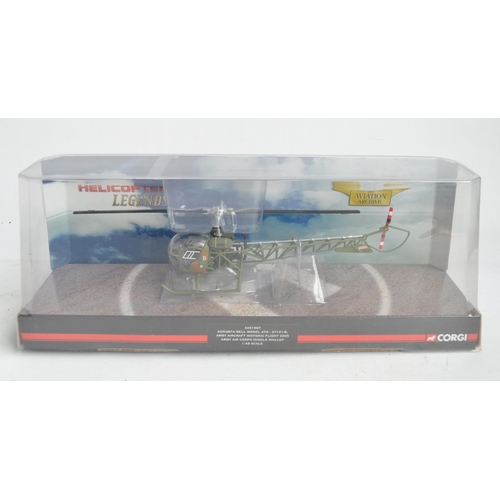 233 - Four diecast and plastic model aircraft to include a 1/48 scale Corgi AA51907 Bell 47G, AAC Historic... 