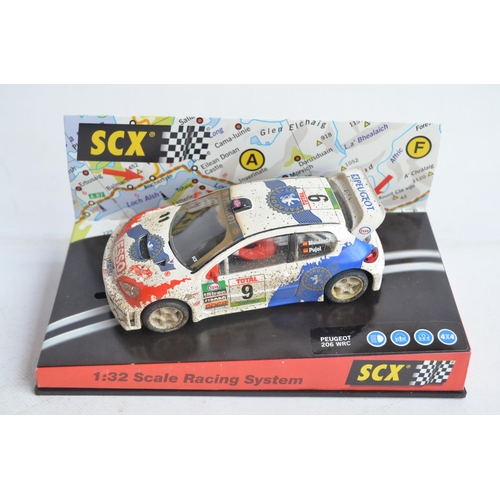 164A - Collection of Scalextric cars and accessories to include 5 cased cars from Fly, Ninco, SCX and Scale... 