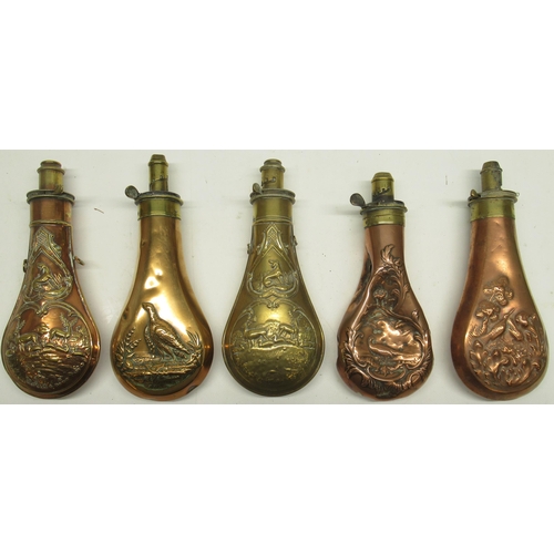 1105 - Five 19th century copper and brass embossed powder flasks, decorated with pheasant, wild fowl and de... 