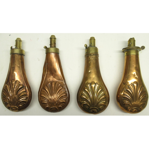 1106 - G & J.W. Hawksley copper and brass embossed powder flask, decorated with shell motif, 20.5cm and thr... 