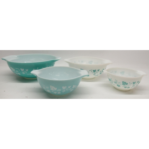 1205 - Set of four graduating JAJ Pyrex 'Cinderella' mixing bowls, gooseberry design in turquoise and white... 