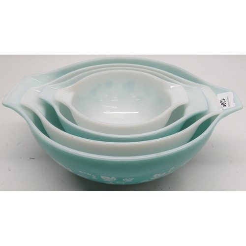 1205 - Set of four graduating JAJ Pyrex 'Cinderella' mixing bowls, gooseberry design in turquoise and white... 