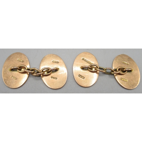 1034 - Pair of 9ct yellow gold cufflinks with engine turned design, stamped 375, 8.2g