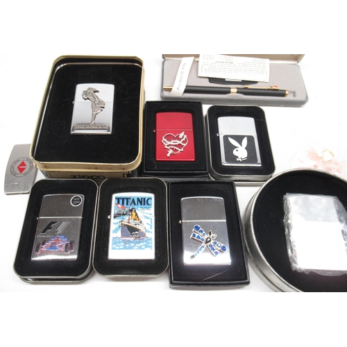 1501 - Collection of Zippo and other lighters, incl. Zippo '1935 Varga Girl' with tin, F1, Playboy, Titanit... 