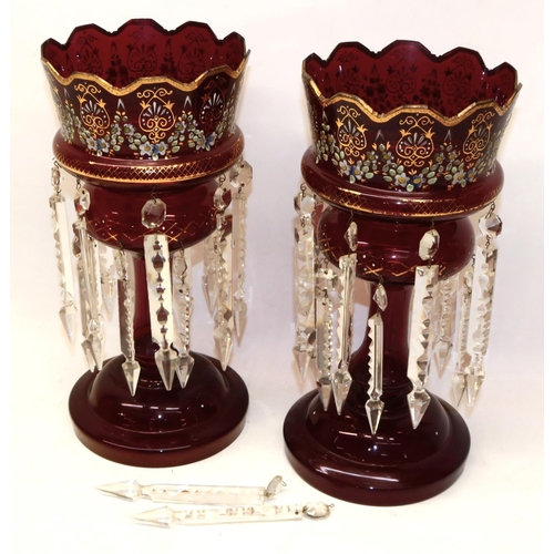 1504 - Pair of Victorian ruby glass table lustres with floral painted decoration, H36cm