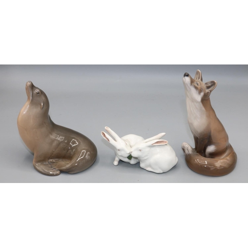 1517 - Royal Copenhagen figures of a fox, sealion, and two rabbits, numbered 1475, 1441, and 065 respective... 