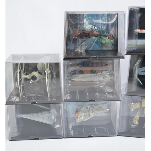 8 - Seventeen cased Star Wars models from DeAgostini (cases unopened/factory sealed) with a binder of as... 
