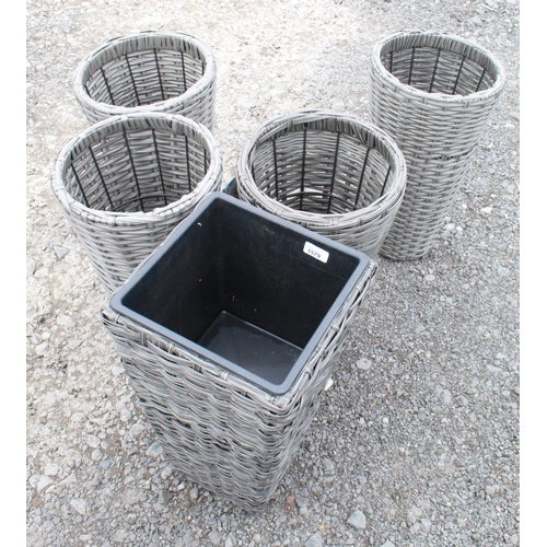 1579 - Set of five Wicker style planters