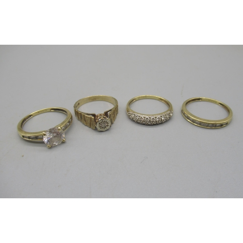 1239 - 9ct yellow gold diamond ring in an illusion setting, size R1/2, 2.9g, and three 14ct yellow gold rin... 