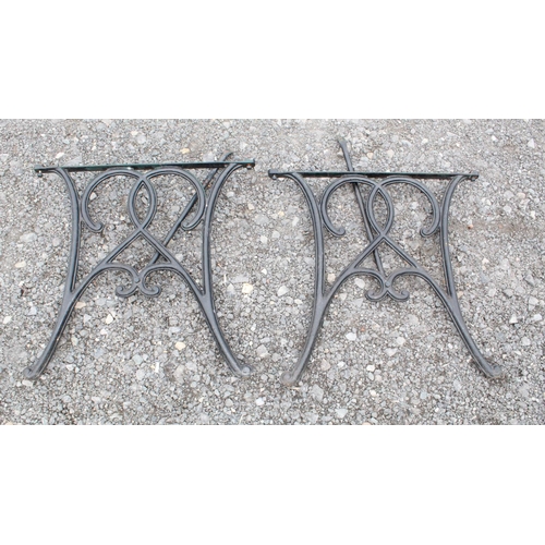 1588 - Pair of table leg ends with scroll design and struts