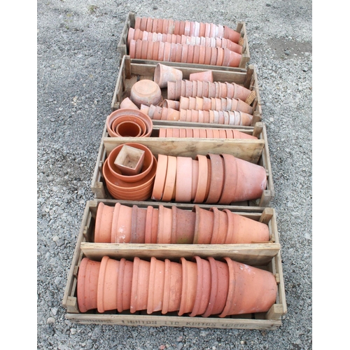 1590 - Large quantity of early 20th century and later terracotta plant pots of various sizes, in four stamp... 