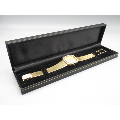 1285 - Ladies Omega De Ville gold and diamond set wristwatch on integrated fine mesh tapering bracelet hall... 
