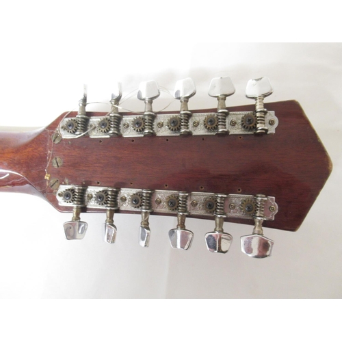 4 - Harmony Model no. H 6860-12, 12 string acoustic guitar, lacking 1 string (Victor Brox collection)