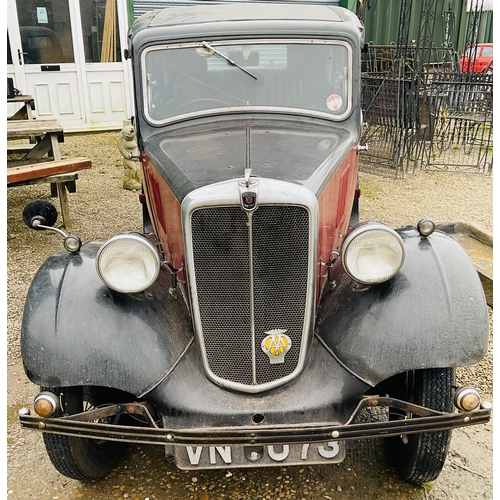 1194A - Classic 1935 Morris 8 saloon in red/black finish. 885cc petrol, historic classification, 4 door, reg... 