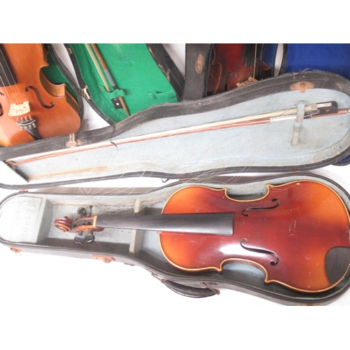 12 - Two violins bearing the replica 'Antonius Stradivarius Cremonenfis Faciebatv Anno 1726' sticker, bot... 