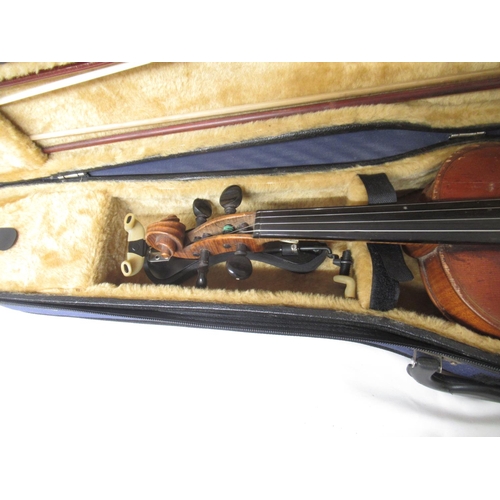 14 - Three unnamed violins, 2 with 2 bows in travel cases and another lacking bow in travel box (Victor B... 