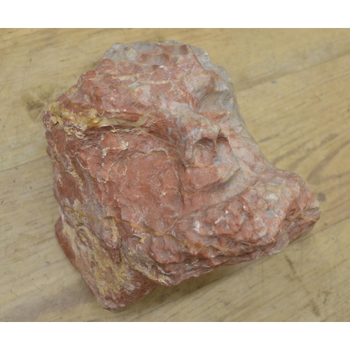 251 - Three large mineral rocks, one appears carved in the form of a human face (Victor Brox collection)