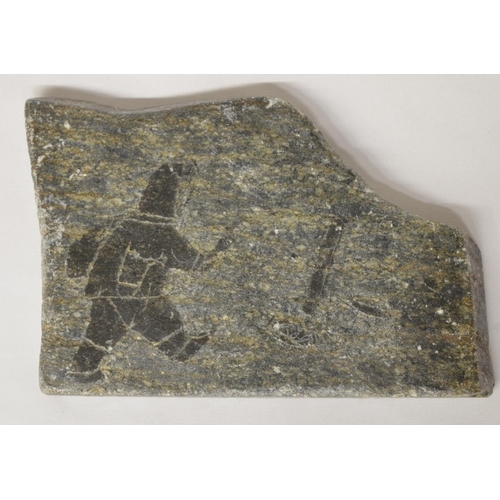 276 - Innuit flat stone carving of an Innuit hunter to one side and Killer Whale to the rear. Also some wr... 