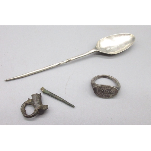 124 - Hellenistic Greek silver insect ring, a Byzantine silver spoon, fragments of a pin brooch. (Victor B... 