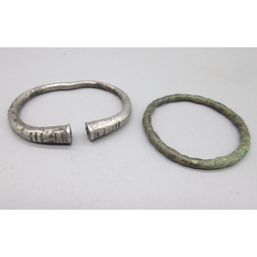 128 - Ancient Persian silver bracelet with linear incised decoration (approx. 400BC), and another metal (V... 