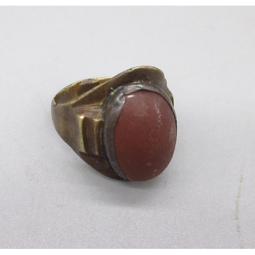 130 - Roman early C6th bronze ring set with cabochon cornelian (Victor Brox collection)