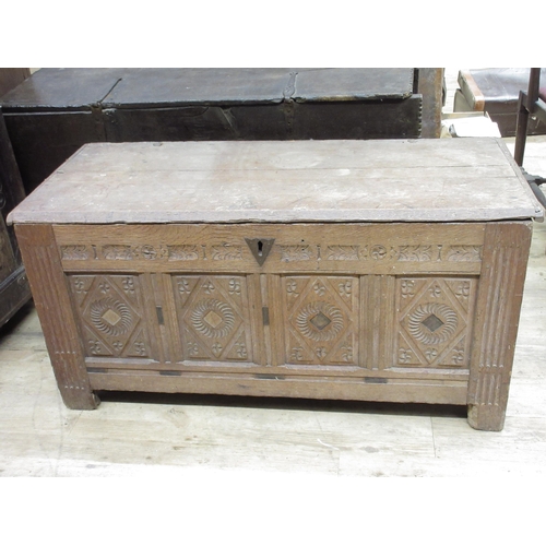 968 - 18th century oak coffer, later planked top above four geometric with stop fluted supports, lozenge c... 