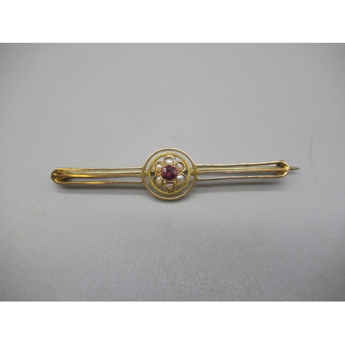 1007 - 9ct yellow gold bar brooch set with pink stone and seed pearl cluster, stamped 9ct, 3.3g