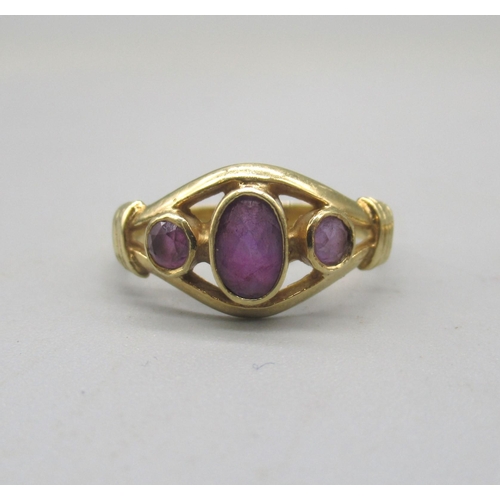 1018 - 9ct yellow gold ring set with three purple stones, size N, and another 9ct gold ring set with purple... 