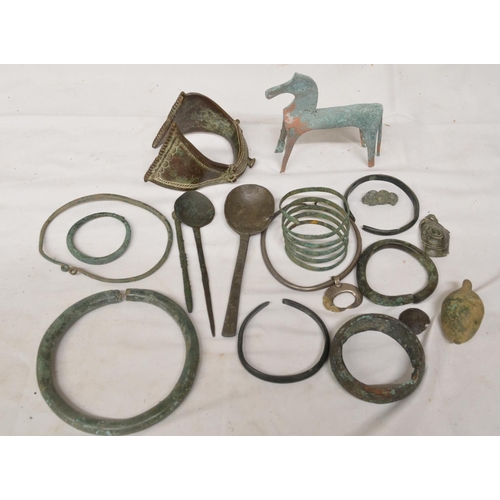 232 - Collection of ancient bracelets and other decorative objects to include Celtic bronze neck and wrist... 