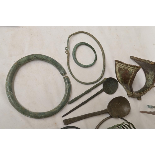 232 - Collection of ancient bracelets and other decorative objects to include Celtic bronze neck and wrist... 