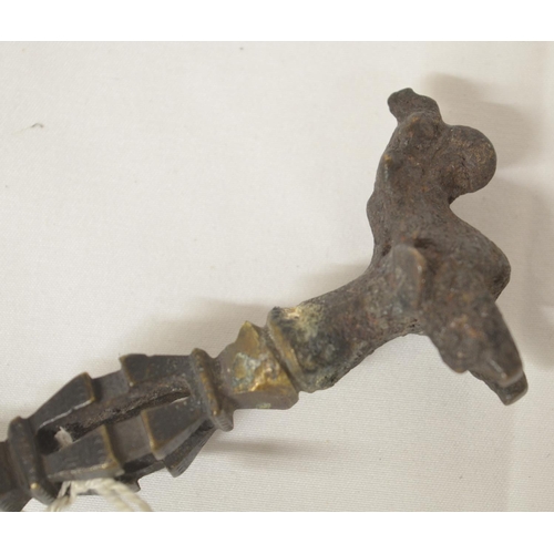 244 - Bronze Griffin finial Circa 2nd century AD attached to a 19th century bronze open work pin, L18cm (V... 