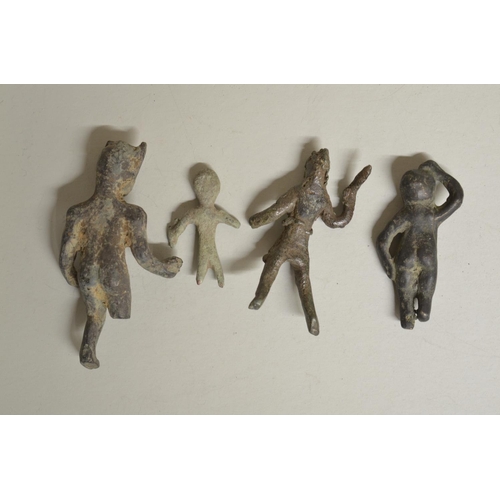 248 - Collection of historical cast metal figures including a Celtic bronze figure holding a Dolphin (with... 