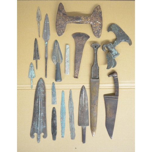 283 - Collection of ancient Greek and Roman copper and bronze knives, spear and arrow heads, a double head... 