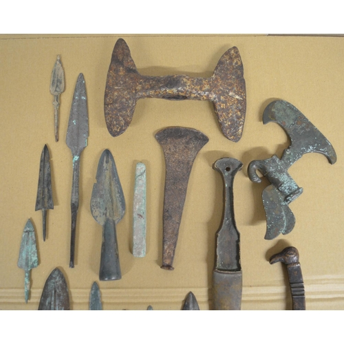 283 - Collection of ancient Greek and Roman copper and bronze knives, spear and arrow heads, a double head... 