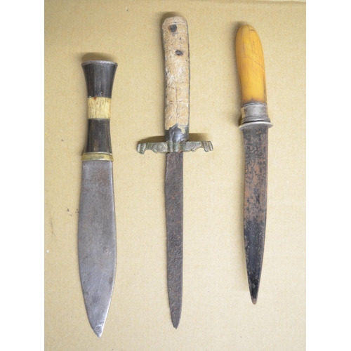 285 - Collection of historical knives to include a Spanish dress dagger, African tribal knife with horn an... 