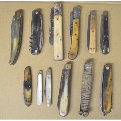 286 - Collection of 12 pocket knives of various styles including bone, horn and mother of pearl handled ex... 