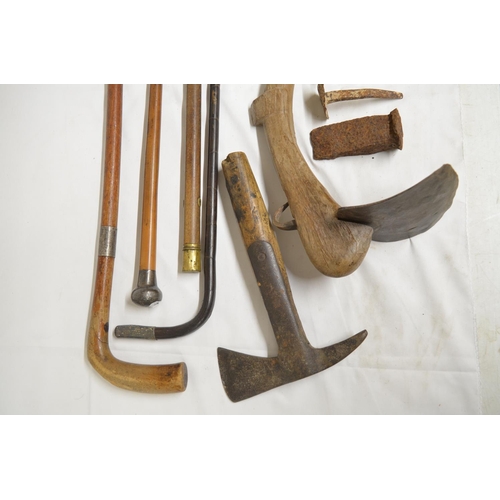 290 - Collection of vintage tools and walking sticks to include a hoe, fireman's axe etc. (Victor Brox col... 