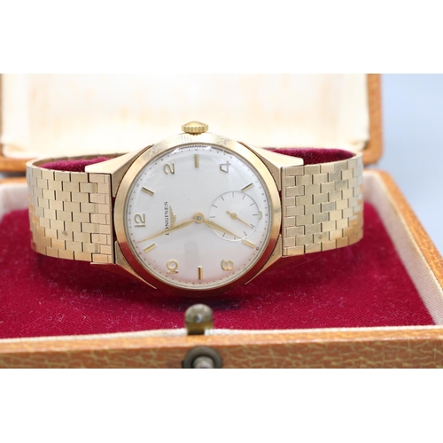 1090 - Longines gold wristwatch on matched D.S. & S. brick link bracelet hallmarked .375, London 1957, sign... 