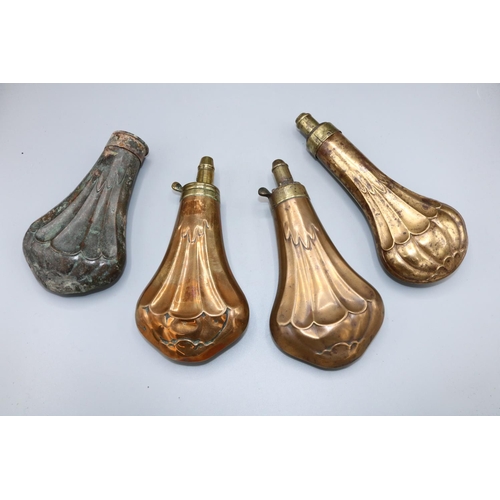 1109 - Two Dixon & Sons C19th copper and brass embossed powder flasks, 19cm and two similar