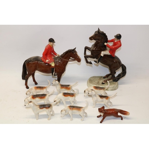 1144 - Beswick fox hunting group comprising Huntsman on rearing horse no. 868, H24cm; Huntsman no. 1501; ei... 