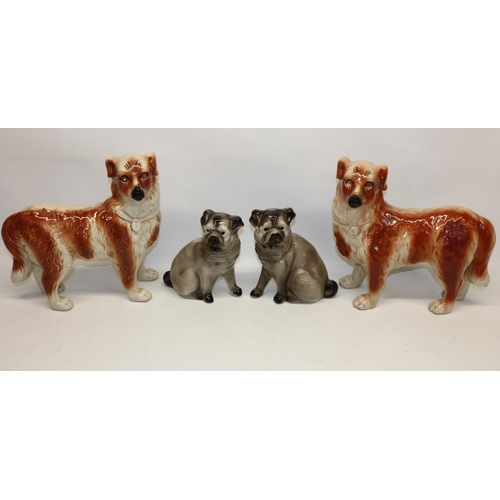 1293 - Pair of Bo'ness pottery style models of standing dogs decorated in red and white, and a pair of simi... 