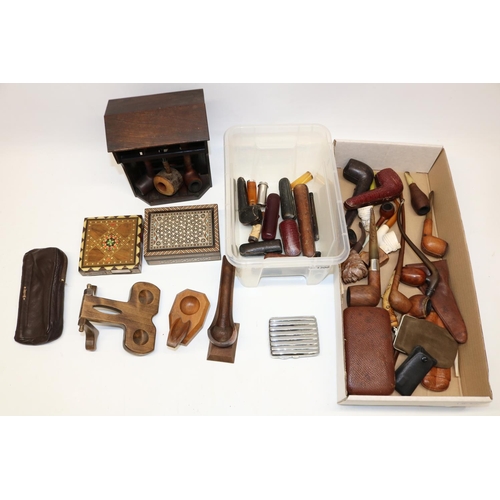 1300 - Collection of pipes and smoking accessories, incl. cased pipes and cigar holders, some with silver c... 