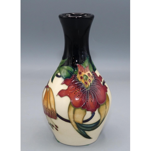 1615 - Moorcroft Pottery, Anna Lily pattern small vase with elongated neck, designed by Nicola Slaney, H14c... 