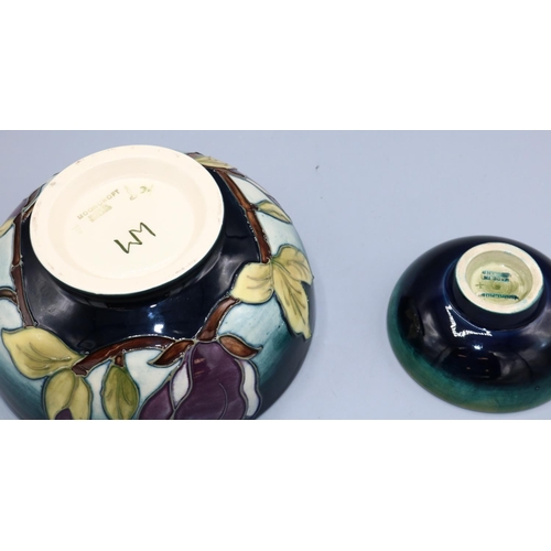 1619 - Moorcroft Pottery, small Columbine design trinket bowl, D9cm, and a Magnolia pattern bowl, D16cm (2)