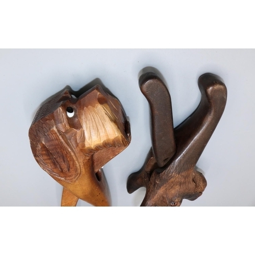 1632 - Two Black Forest style carved wood nutcrackers in the form of a goat and a dog, max. L22.5cm