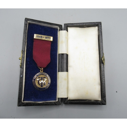 1214 - Transport and general workers union badge, 1945-1973, 9ct gold and enamel, presented to BRO.A.CROOKS... 