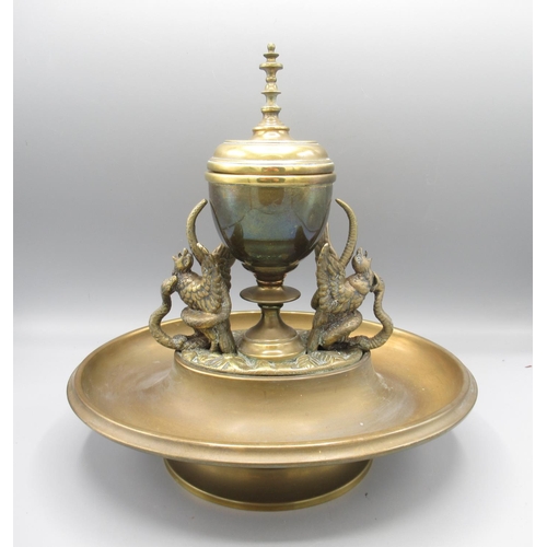 1289 - Brass inkwell in the form of an urn flanked by snakes and birds, L25cm