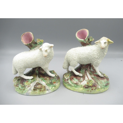 1294 - Pair of Staffordshire sheep spill vases, H12.5cm, A/F