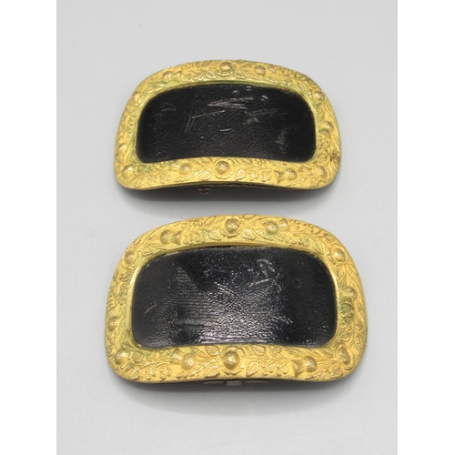 1311 - Pair of 19th century gilt metal dress shoe buckles decorated in relief with roses, thistles and sham... 