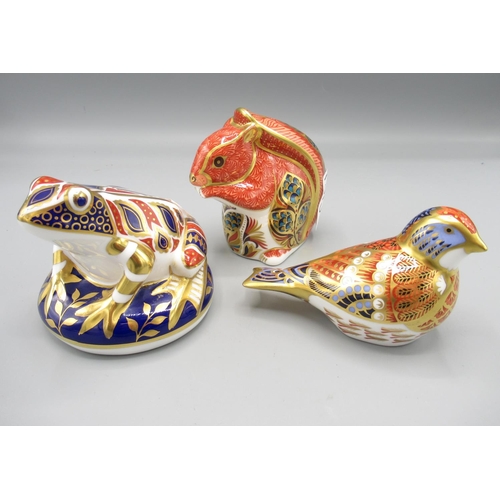 1393 - Three Royal Crown Derby paperweights, comprising Frog, Squirrel and Linnet, all with gold stoppers, ... 